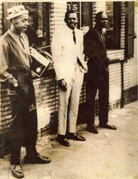 Historical photograph of Father Allah, Clarence 13X, with associates